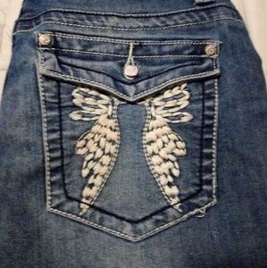 Cutoffs with angel wings on back